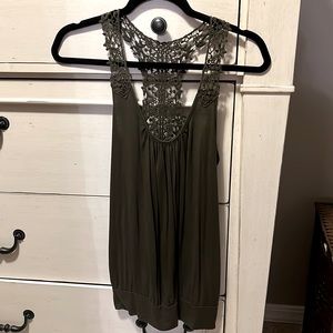 Green racerback tank with doily straps and back